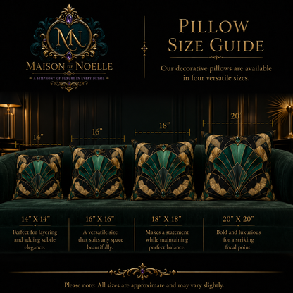Émeraude Art Deco faux suede decorative pillow with emerald green, black and antique gold geometric fan design styled on a luxury green velvet sofa.